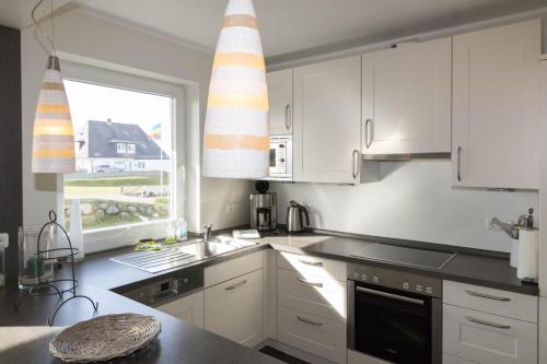 Dapur atau dapur kecil di Hüs Auert Tharep, Wohnung 5