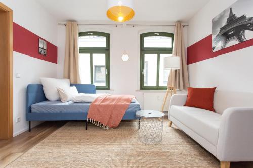 En eller flere senge i et værelse på FULL HOUSE Studios - Little Paris Apartment - Nespresso + WiFi inkl.