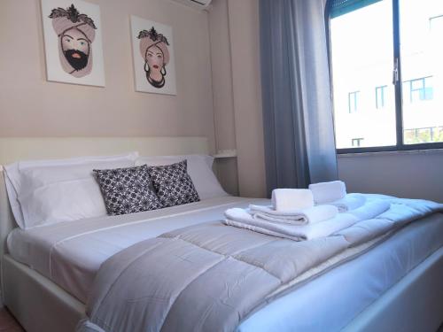 Giường trong phòng chung tại Taormina Center Private Apartments By Fragranza Di Sicilia