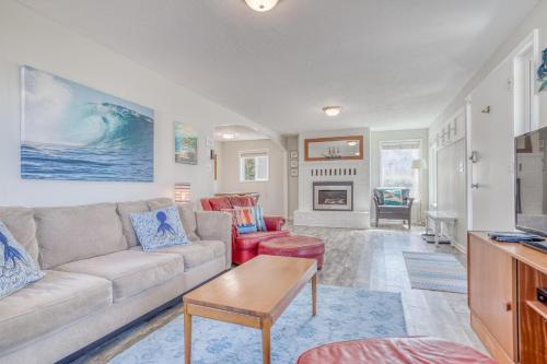 a living room with a couch and a table at Surf Shack in Lincoln City