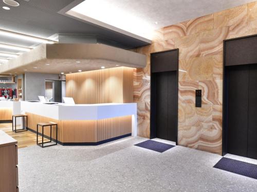 Postel nebo postele na pokoji v ubytování HOTEL MYSTAYS Soga