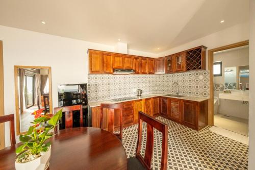 Kuchyň nebo kuchyňský kout v ubytování Gaia Hotel Phu Quoc