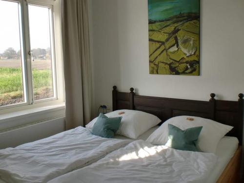 Una cama o camas en una habitación de Villa GleisBett