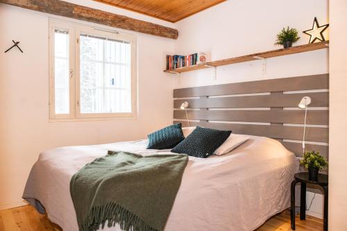 Кровать или кровати в номере Ruka Etelärinne Lodge