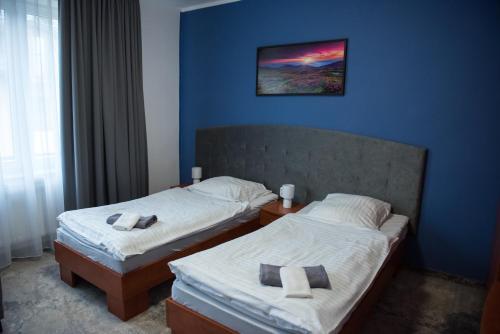 Ein Bett oder Betten in einem Zimmer der Unterkunft Hotel Paradiso