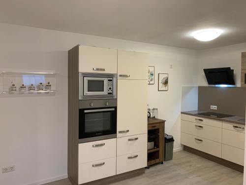 Kjøkken eller kjøkkenkrok på Apartments WK