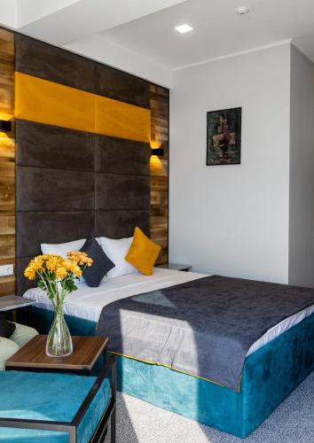 Postel nebo postele na pokoji v ubytování BG Palace Hotel