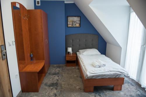 Ein Bett oder Betten in einem Zimmer der Unterkunft Hotel Paradiso