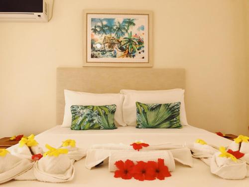 Katil atau katil-katil dalam bilik di Panorama Guesthouse Apartments Beau Vallon Beach