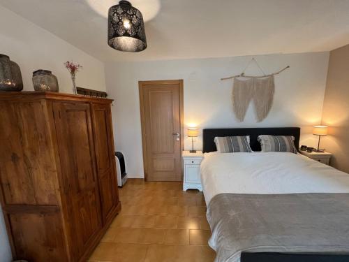 Ένα ή περισσότερα κρεβάτια σε δωμάτιο στο B&B Casa Mil Sueños