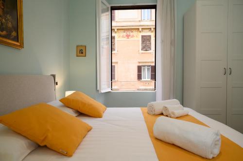 Ένα ή περισσότερα κρεβάτια σε δωμάτιο στο Magnoliahome ai musei