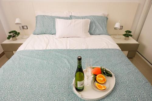 Postel nebo postele na pokoji v ubytování Apartament Arenales Playa and Sun