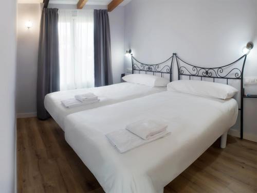 Кровать или кровати в номере Casa do cabo