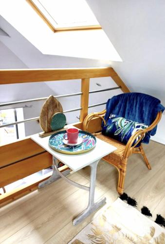 Posezení v ubytování Coup de Coeur sur le Port de ST GOUSTAN, Trés Bel Appartement avec Terrasse