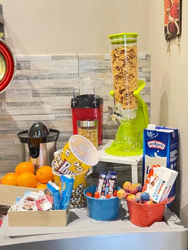 a counter with food and other food items on it at PortaMedina House in Naples