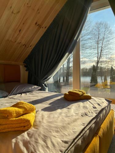 Postel nebo postele na pokoji v ubytování Karmuszka Slow