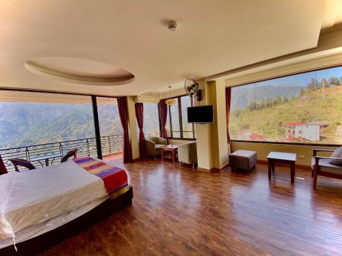 Ένα ή περισσότερα κρεβάτια σε δωμάτιο στο Sapa Vista Hotel