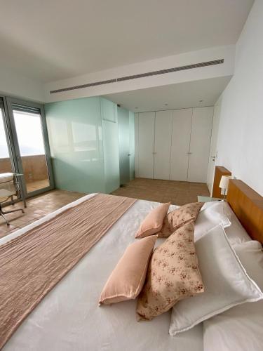 Ein Bett oder Betten in einem Zimmer der Unterkunft Iris Zahara