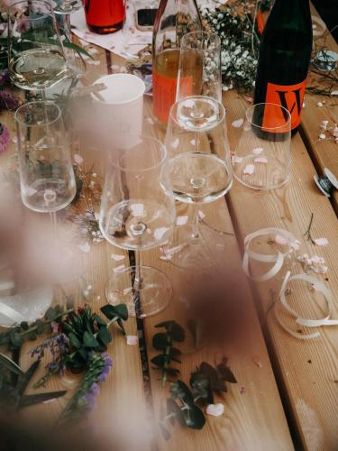 a table with wine glasses on top of it at Weinhotel Wasem in Ingelheim am Rhein