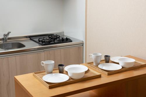 Kuchyňa alebo kuchynka v ubytovaní Minn Shin-Osaka