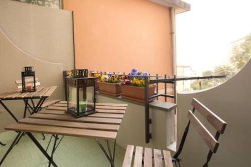 a room with two benches and a table and a window at La Casa di Cheyenne - SEA VIEW 011019-LT-0221 in Monterosso al Mare