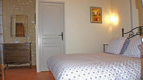 Postel nebo postele na pokoji v ubytování Le Guet de Chouette