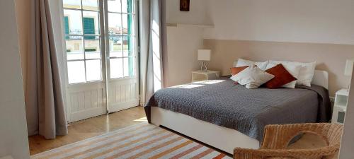 Posteľ alebo postele v izbe v ubytovaní Vivenda Faria