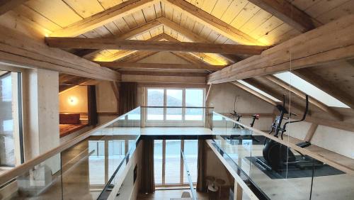 a kitchen with a glass counter top in a house at Kranzmuehle - Ankommen am Achensee in Achenkirch