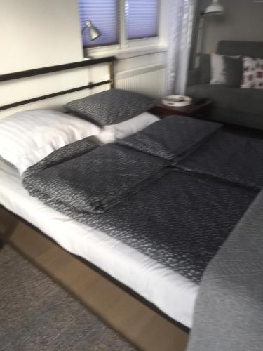 Postel nebo postele na pokoji v ubytování Zielone Studio