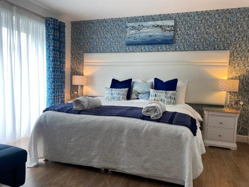 Ένα ή περισσότερα κρεβάτια σε δωμάτιο στο Toppesfield House B&B