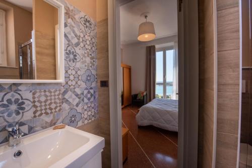 Koupelna v ubytování Hotel Tigullio