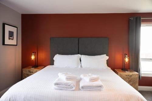 Postel nebo postele na pokoji v ubytování Grianaig Guest House & Restaurant, South Uist, Outer Hebrides