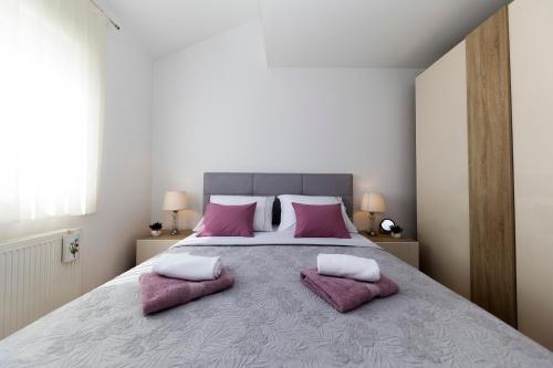 Postel nebo postele na pokoji v ubytování Modern apartment Zadar - Višnjik sport center area