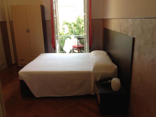 Katil atau katil-katil dalam bilik di Hotel Liberty
