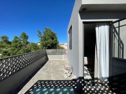 a view of a balcony of a house at Casa Ixaya by Barrio México in Guadalajara