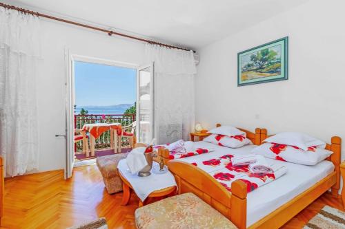 Posteľ alebo postele v izbe v ubytovaní Rooms and Restaurant Danica