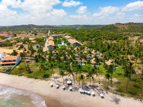 an aerial view of a resort on the beach at Carneiros Beach Resort in Praia dos Carneiros