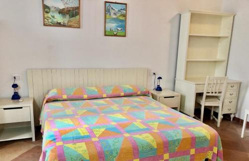 Ένα ή περισσότερα κρεβάτια σε δωμάτιο στο Rocca Sul Mare Hotel