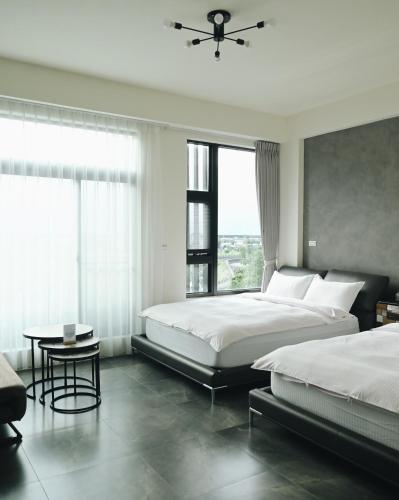 Katil atau katil-katil dalam bilik di 宜蘭-讀好民宿 Read Nice House B&B 電梯民宿