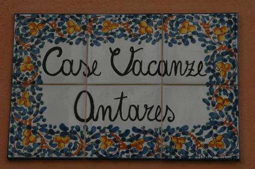 a sign that says cavezona umbras on a tile wall at Casa Vacanze Antares in Portopalo