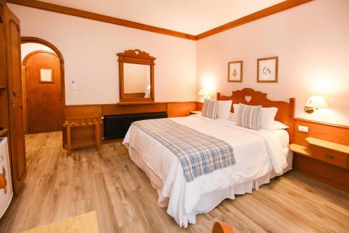 Hotel das Hortênsiasにあるベッド