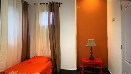 Postel nebo postele na pokoji v ubytování Manaya Bed & Breakfast