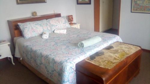 Ένα ή περισσότερα κρεβάτια σε δωμάτιο στο Elwandle Guest House