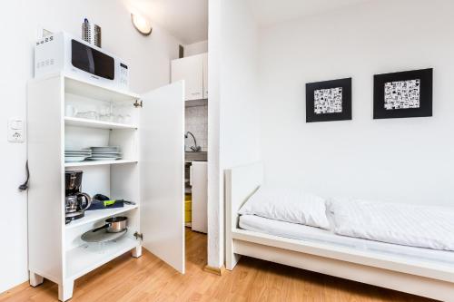 Llit o llits en una habitació de Budget Apartment Köln