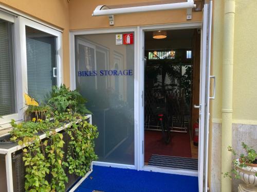 an entrance to a glass doorway to a building at OASIS Golden Lagoon Chalet in Venice-Lido