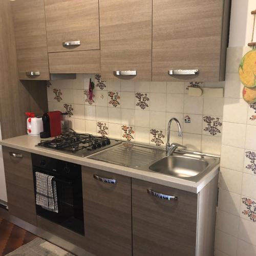 Η κουζίνα ή μικρή κουζίνα στο Apartment Parmense
