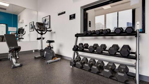 a gym with treadmills and machines in a room at Best Western Chicago Downtown-River North in Chicago