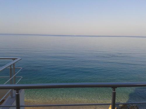 a view of the ocean from a cruise ship at Magic Ionian Apartments & Rooms in Himare