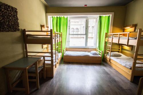Säng eller sängar i ett rum på Treestyle Hostel
