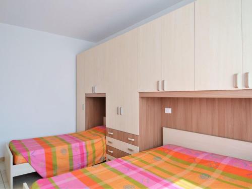 Posteľ alebo postele v izbe v ubytovaní Lake Como Apartment in Dervio